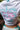 White shirt with turquoise palm tree design and pink text reading 'Tell Only Your Best Friends'