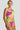 Model wearing a colorful two-tone bikini featuring purple and green colors