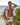 Man in floral beachwear standing by the seaside