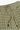 Close-up of a textured green shorts with a drawstring.