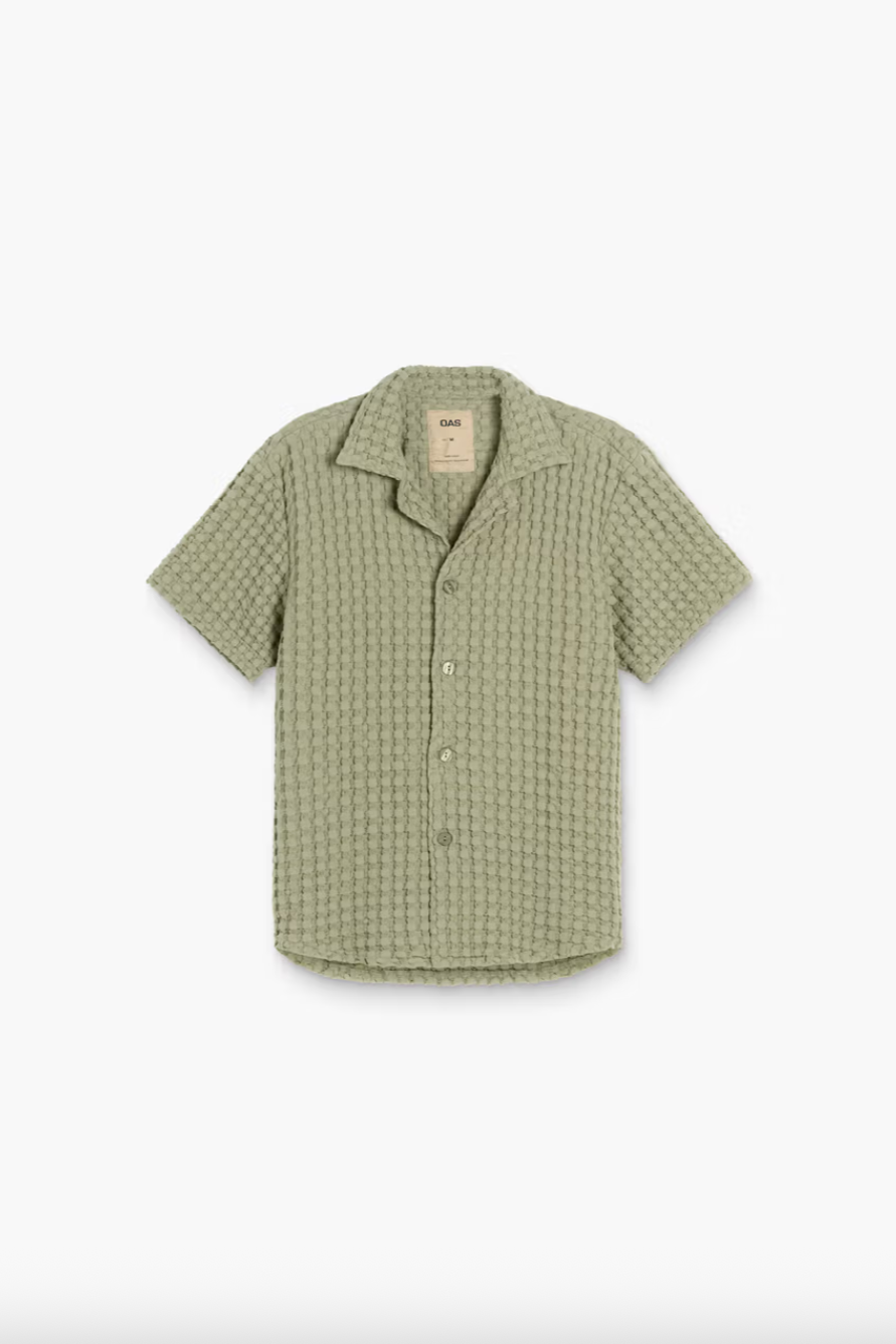 Green checkered shirt on a white background